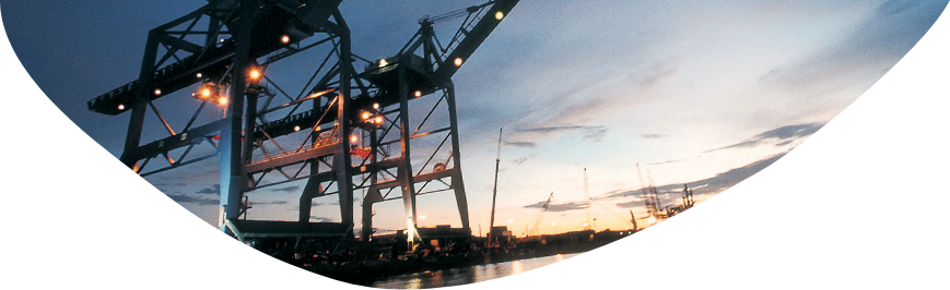 Docking cranes at sunset